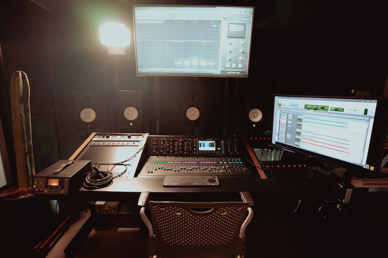 Violin players playing in orchestra on the street